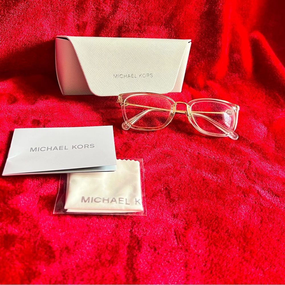 Michael Kors women’s frames clear w/ gold.